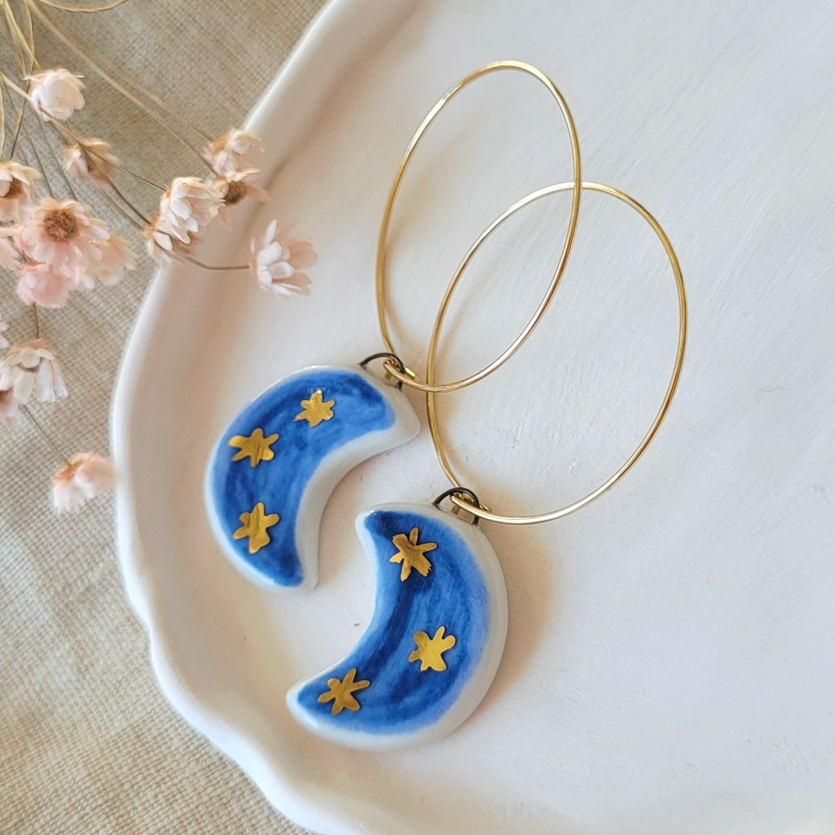 Porcelain dangle earrings with gold "Dark blue moons with little gold stars"