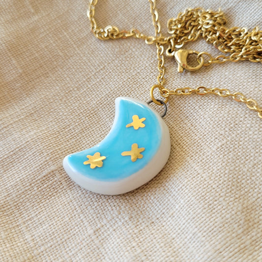 Porcelain necklace with gold "Light blue moon with gold stars"