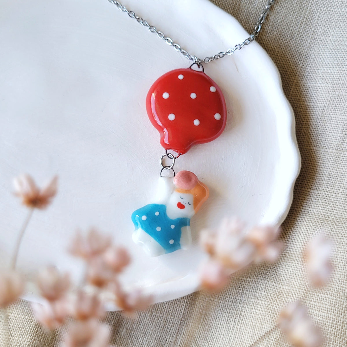 Porcelain necklace "Girl with red balloon"