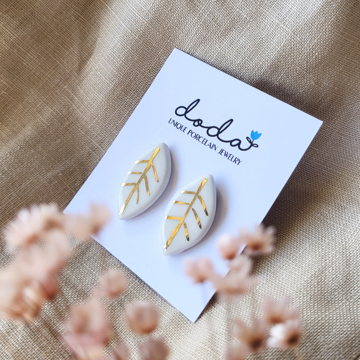 Porcelain stud earrings with gold "White leaves"