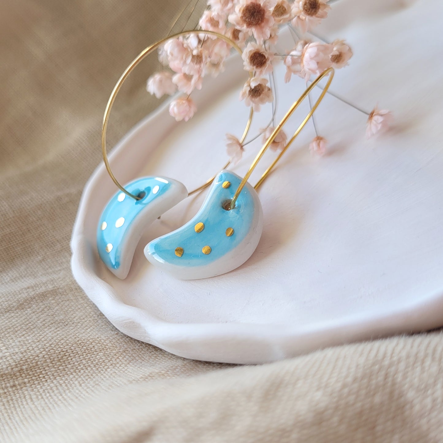 Porcelain dangle earrings with gold "Light blue moons"