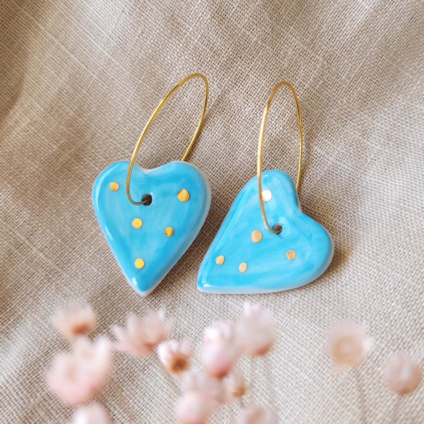Porcelain dangle earrings with gold "Light blue hearts"