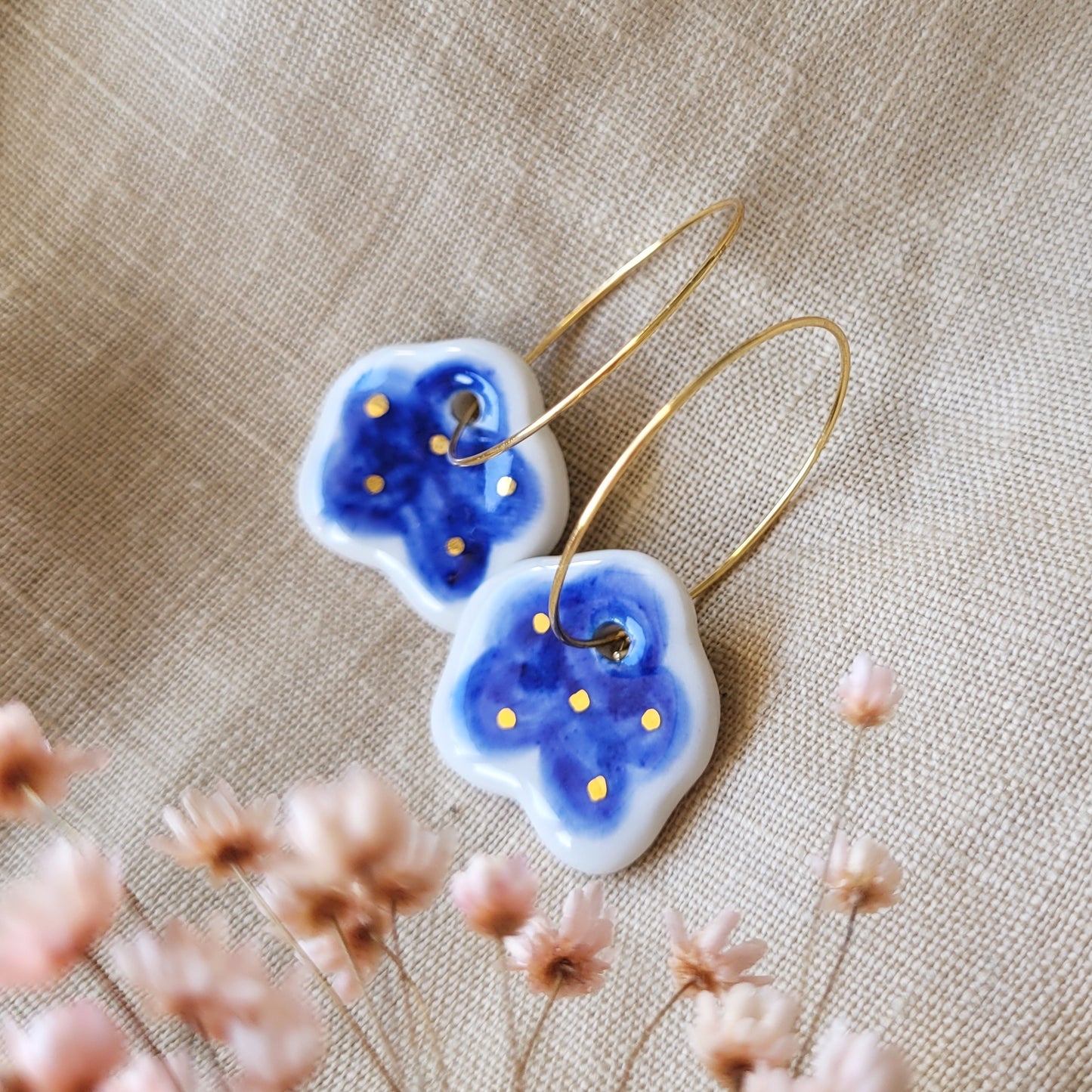 Porcelain dangle earrings with gold "Dark blue clouds"