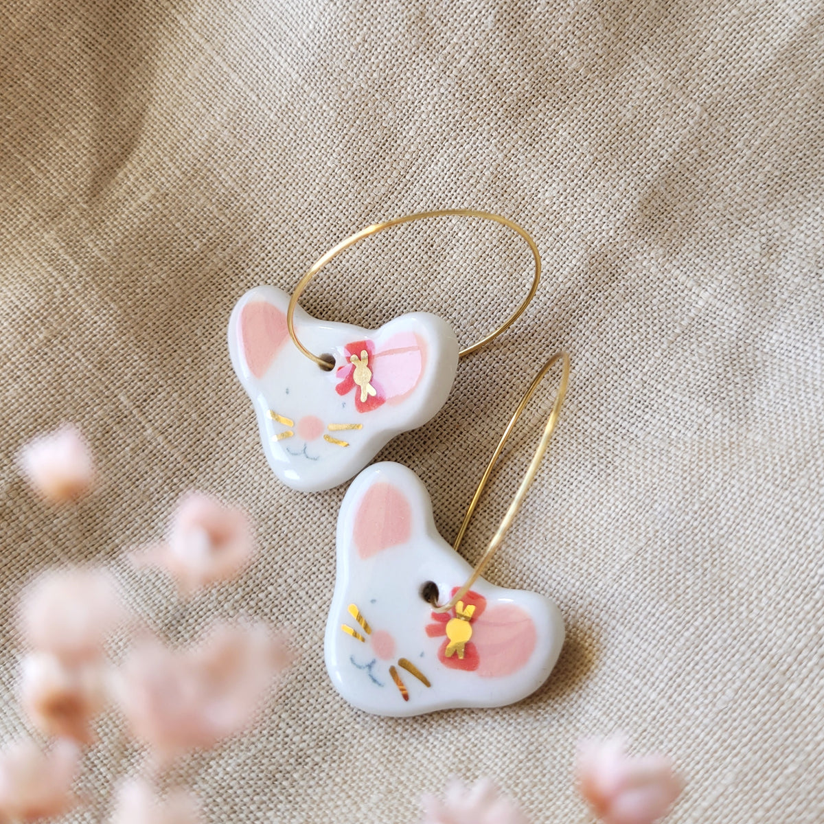 Porcelain dangle earrings with gold "Mices with bows"
