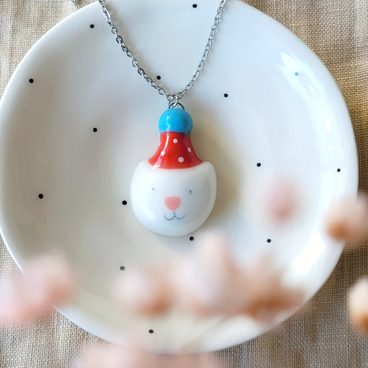 Porcelain necklace "Party kitty with red hat"