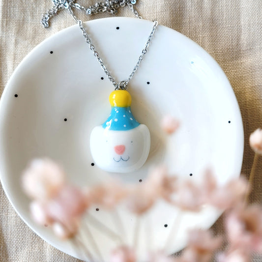 Porcelain necklace "Party kitty with blue hat"