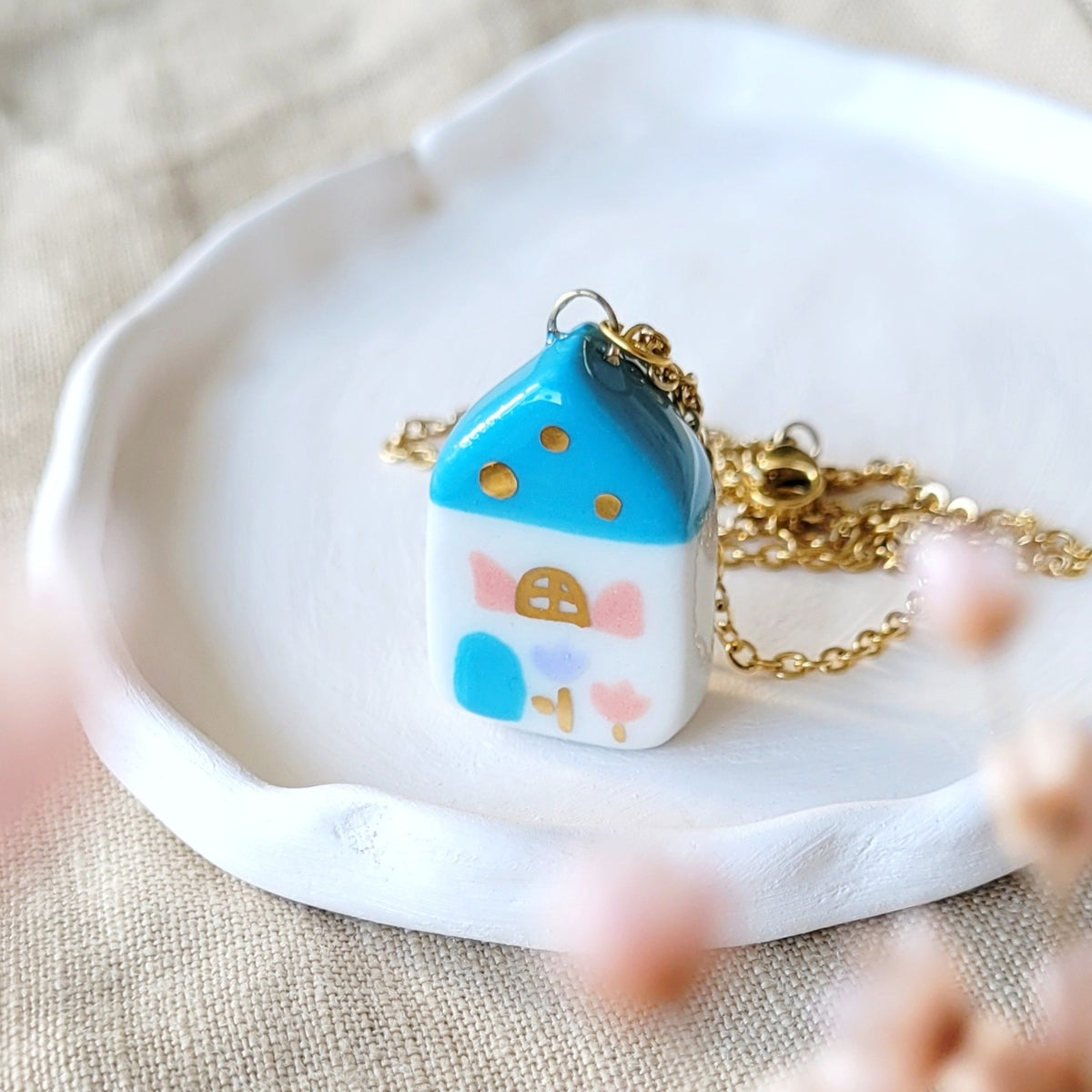 Porcelain necklace with gold "Blue house with pink window"