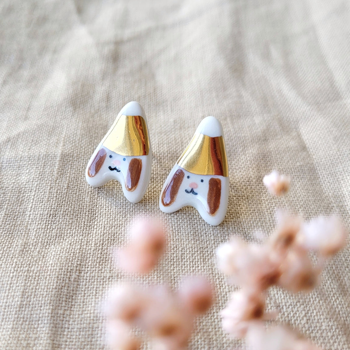 Porcelain stud earrings with gold "Puppies with gold hats"