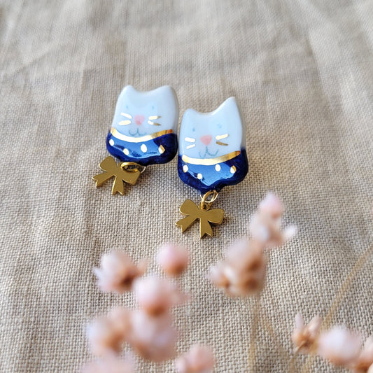Porcelain stud earrings with gold "Kitties with dark blue collars and bows"