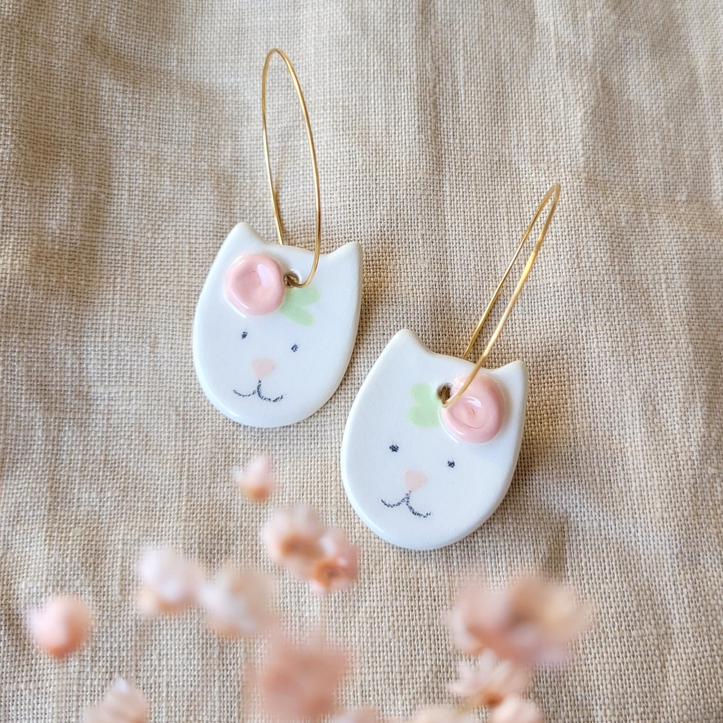 Ceramic dangle earrings "Kitties with flower"