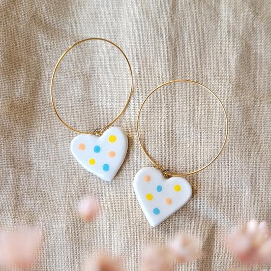 Ceramic dangle earrings "Small white hearts with dots"