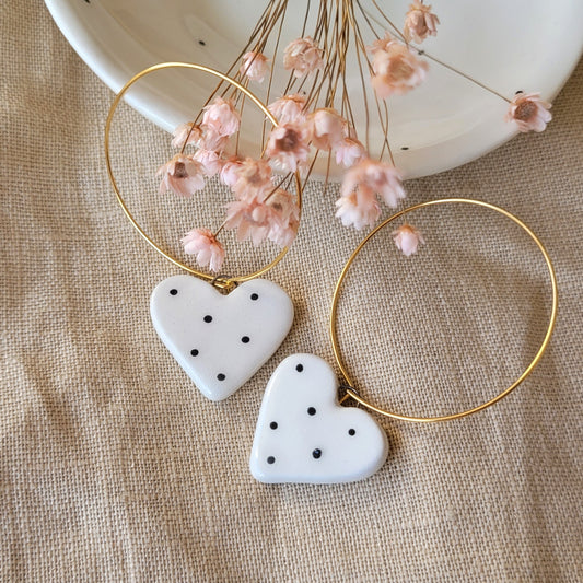 Ceramic dangle earrings "Small white hearts with black dots"