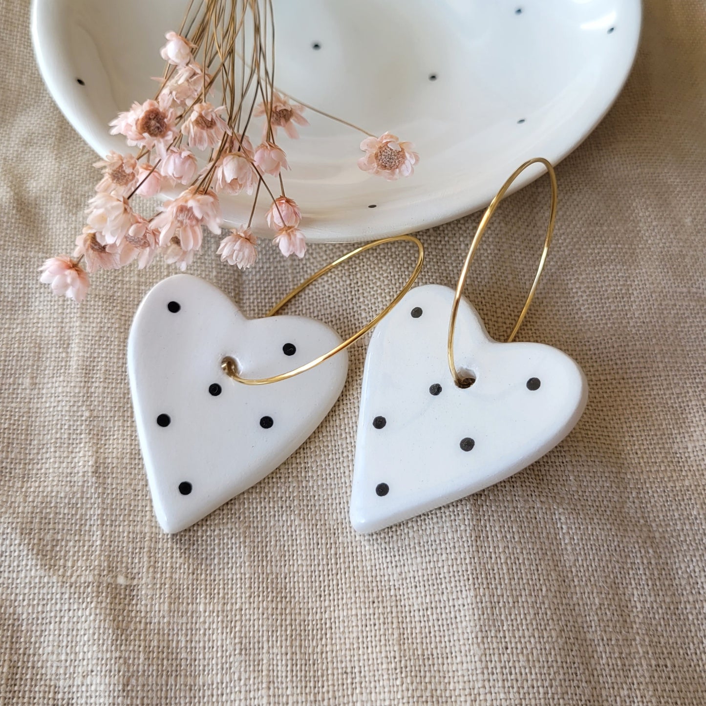 Ceramic dangle earrings "Big white hearts with black dots"