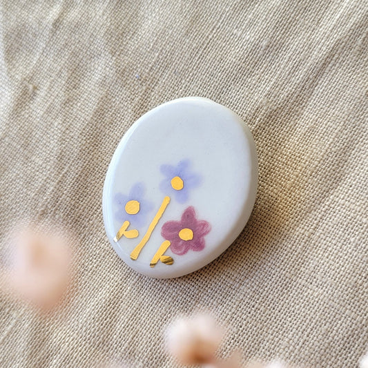 Porcelain brooch with gold "Purple and dark pink flowers"