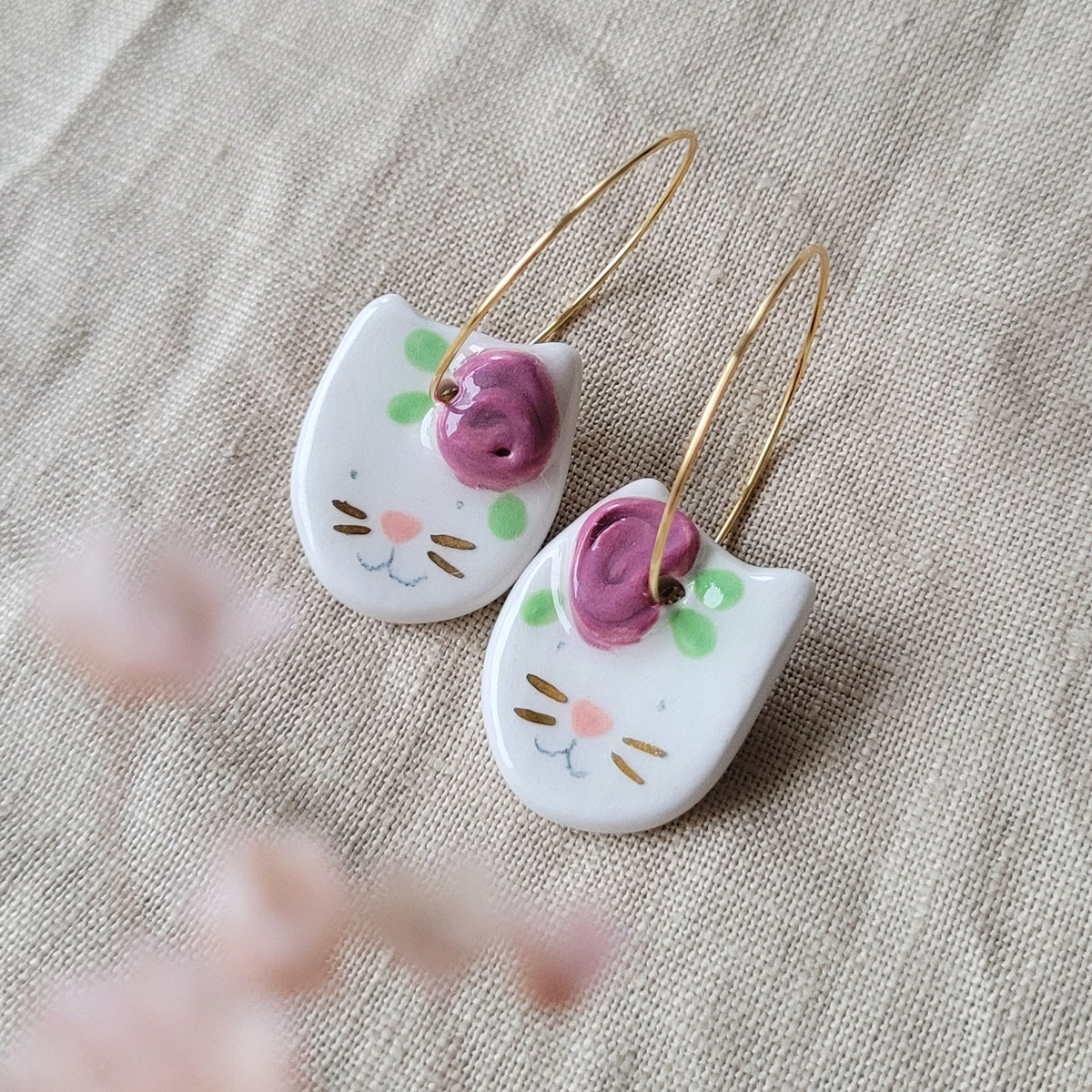 Porcelain dangle earrings with gold "Cats with dark pink flowers"