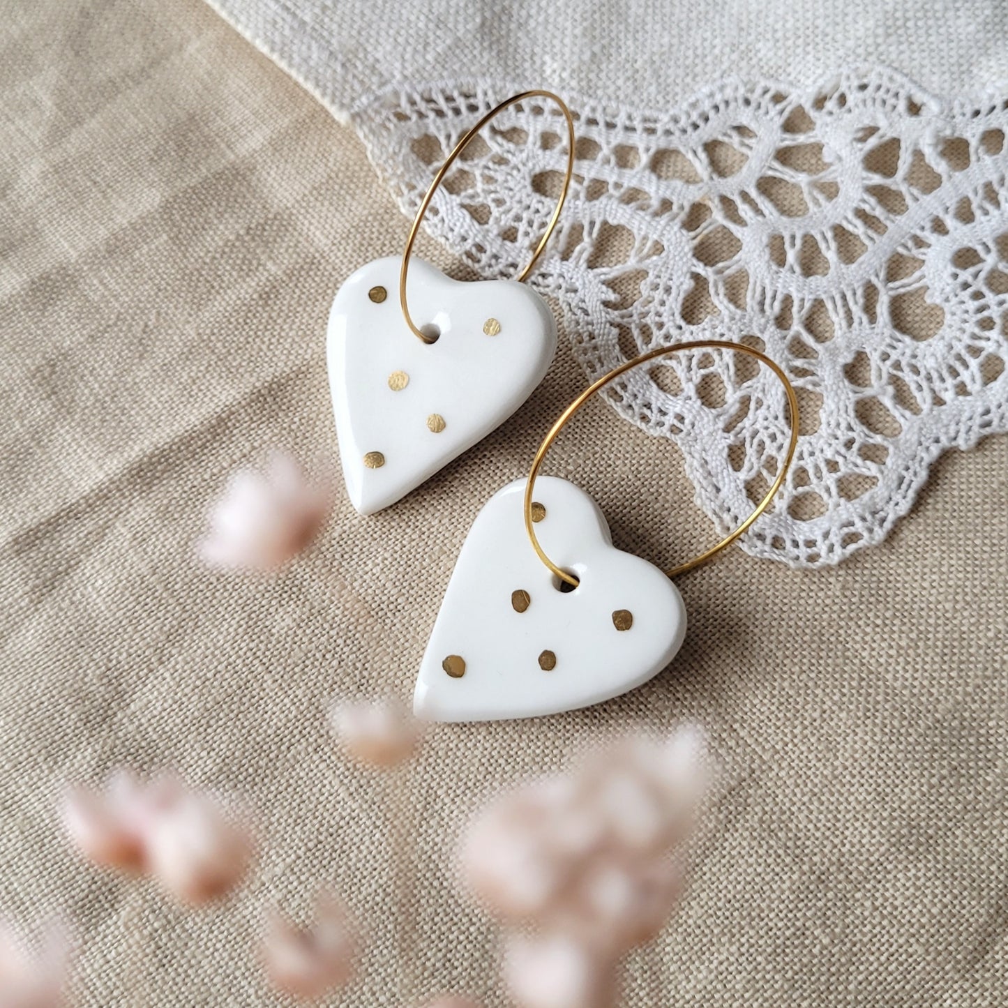 Porcelain dangle earrings with gold "White hearts"