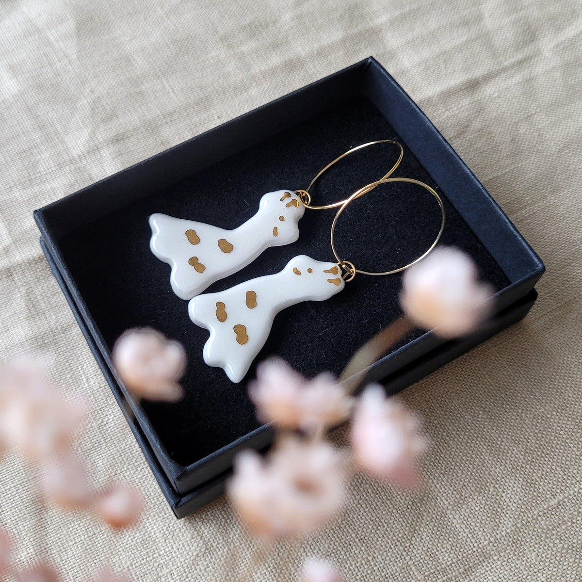 Porcelain dangle earrings with gold " Giraffes"