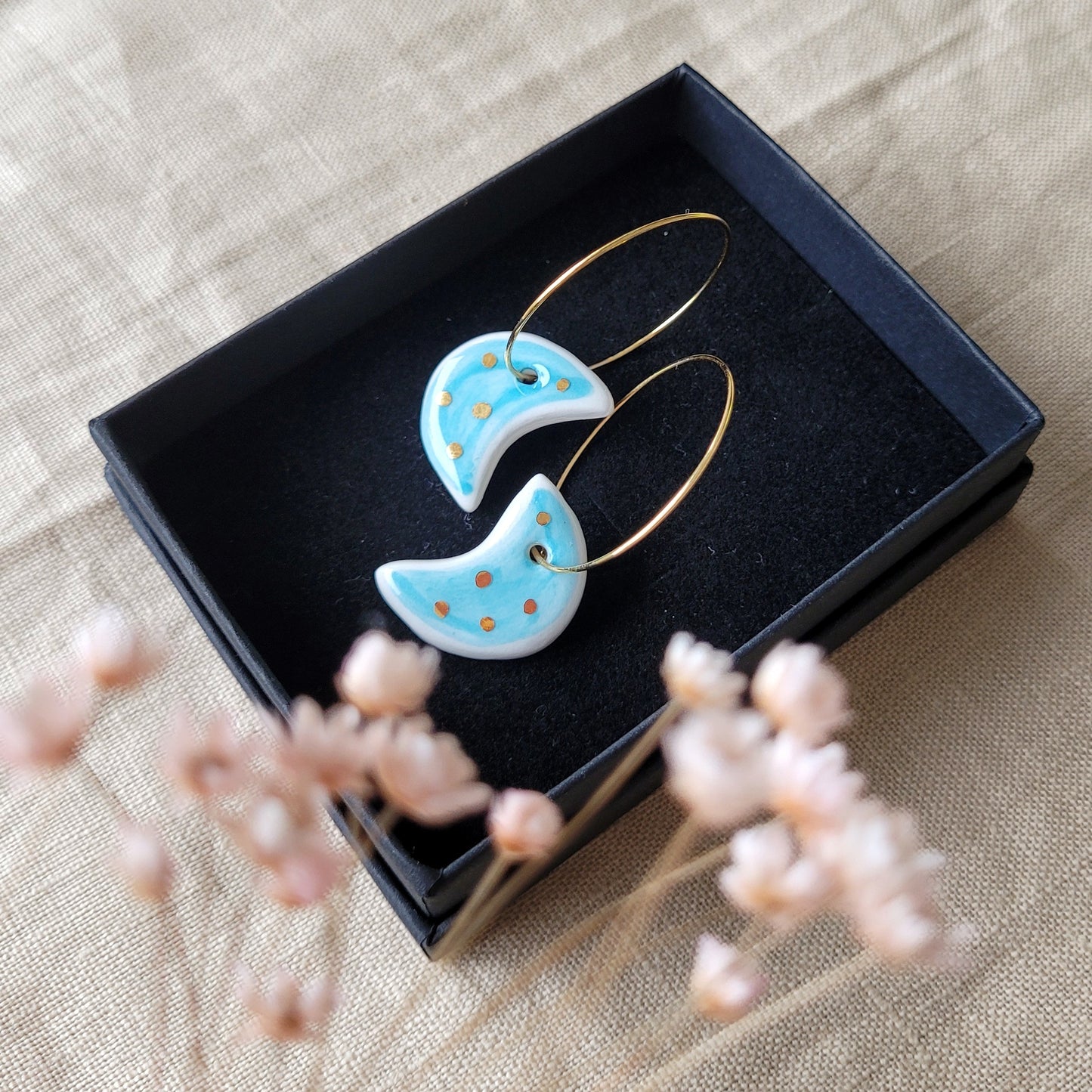 Porcelain dangle earrings with gold "Light blue moons"