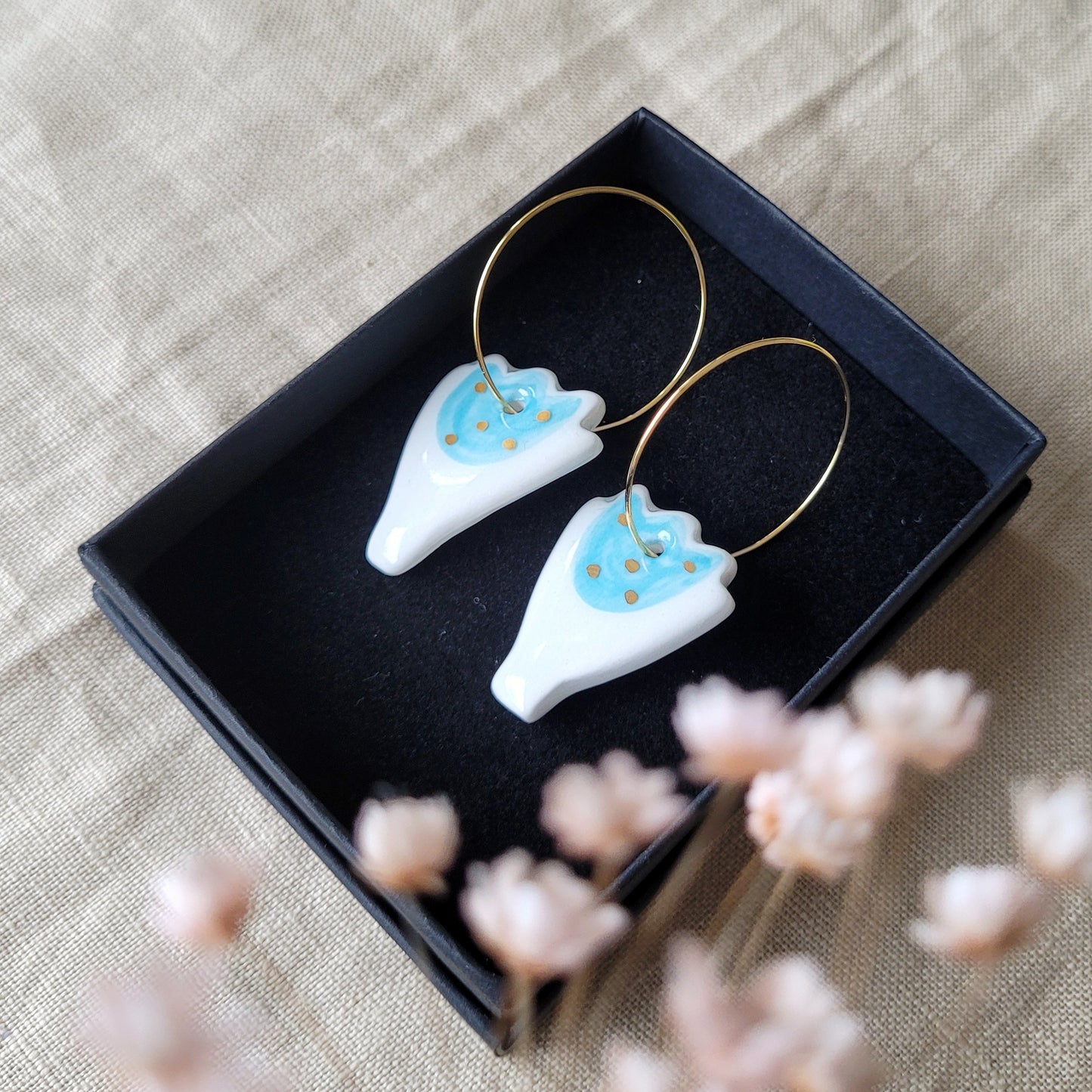 Porcelain dangle earrings with gold "Light blue tulips"