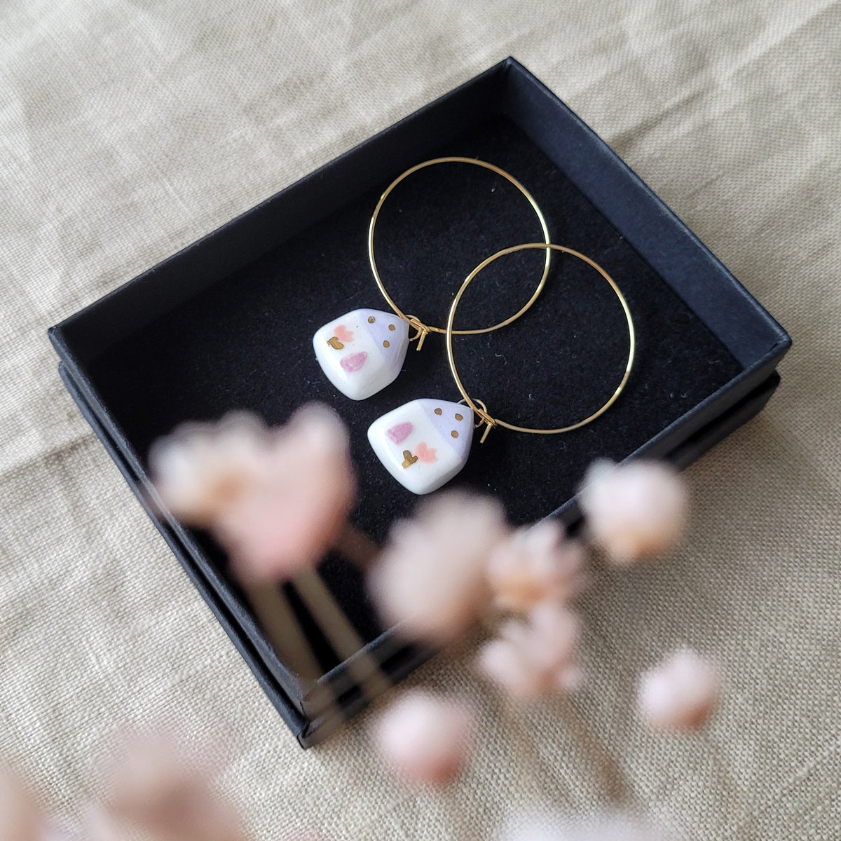 Porcelain dangle earrings with gold "Tiny purple houses"