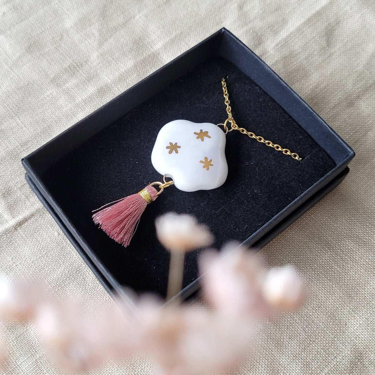 Porcelain necklace  with gold "Light purple and white cloud"