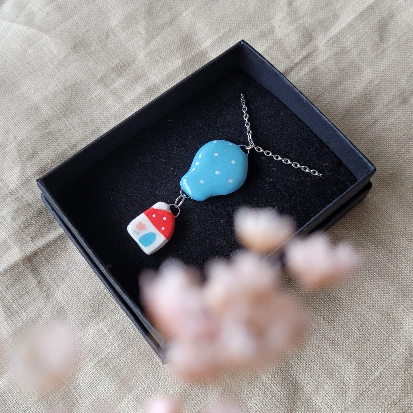 Porcelain necklace "House and blue balloon"