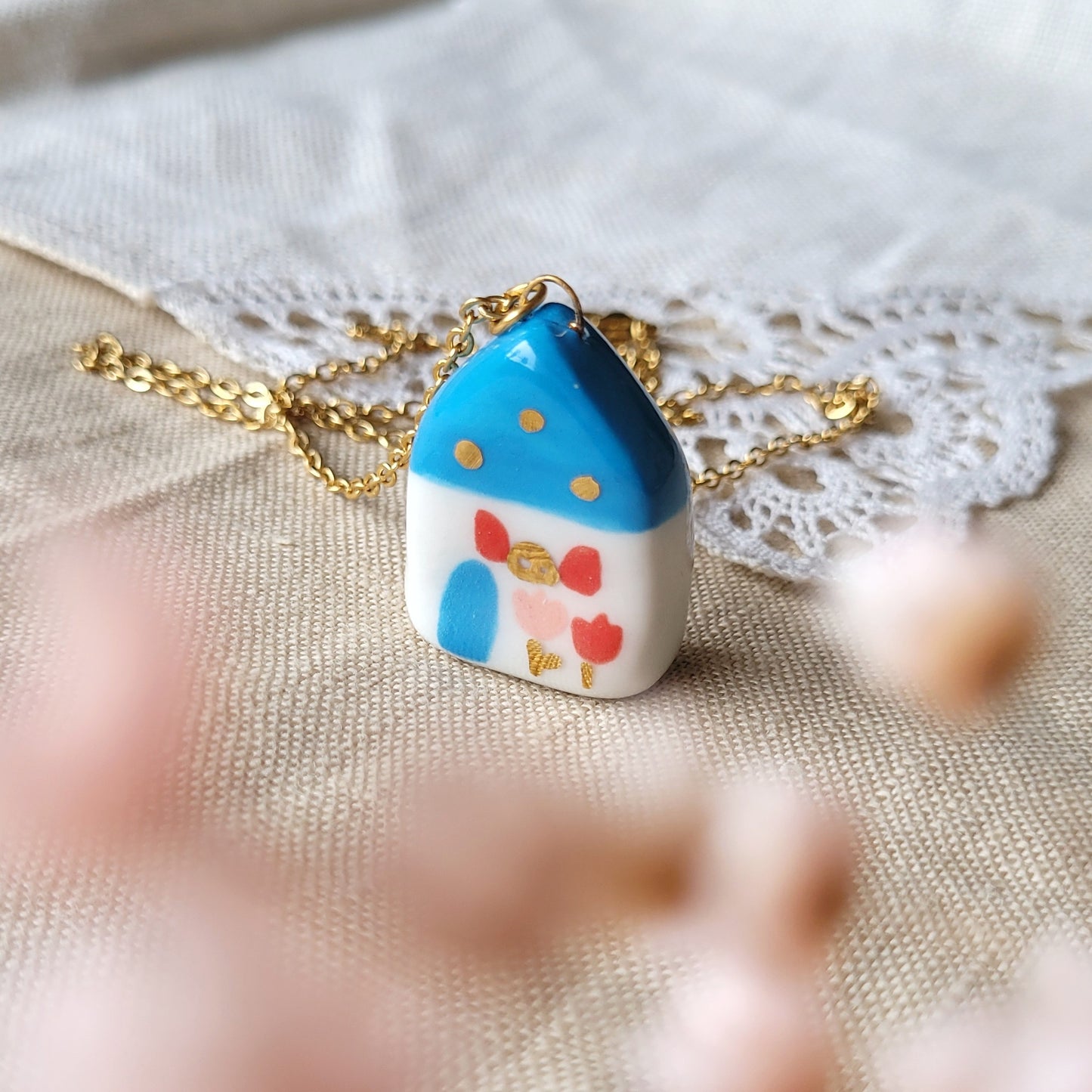 Porcelain necklace with gold "Blue house with red window"