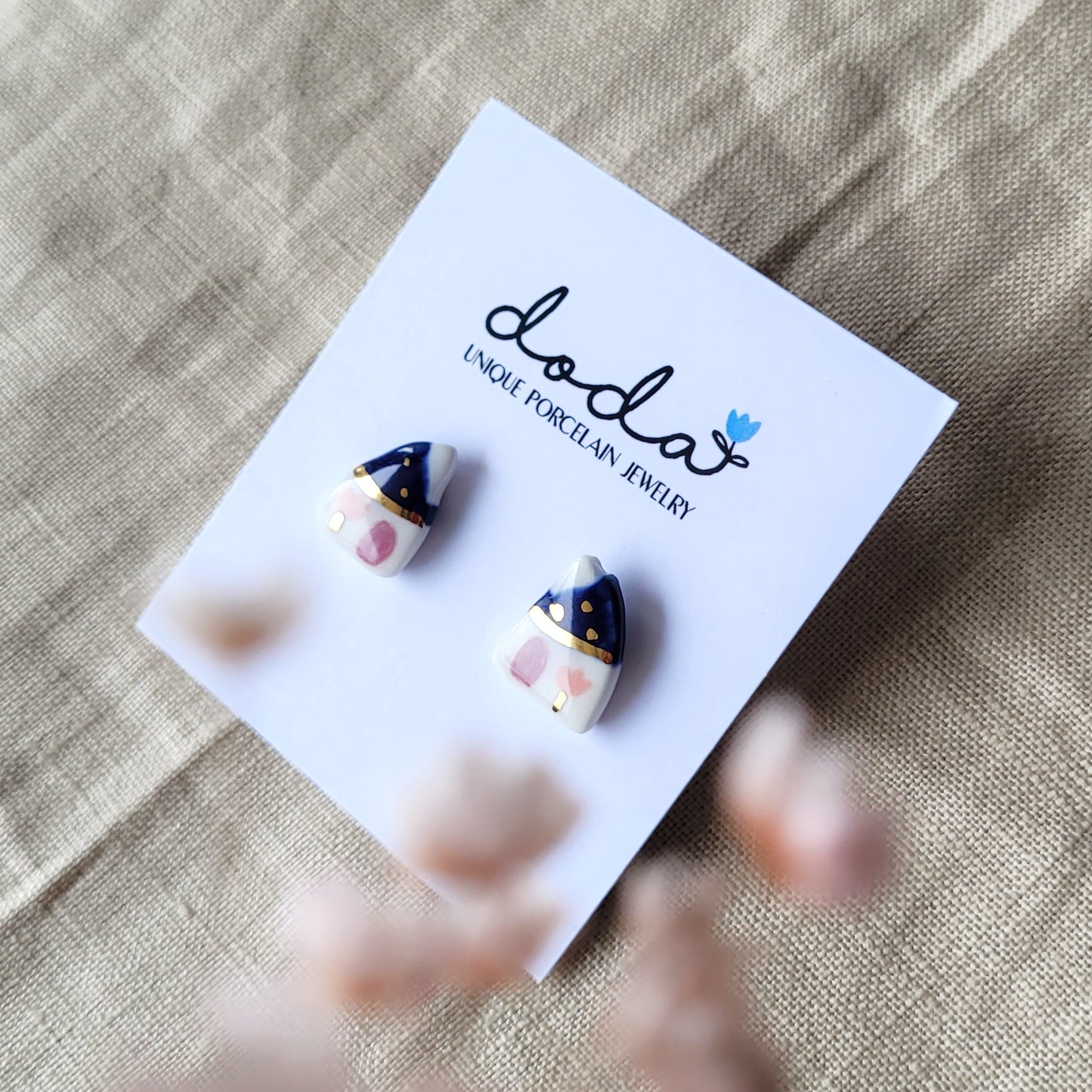 Porcelain stud earrings with gold "Tiny dark blue houses"