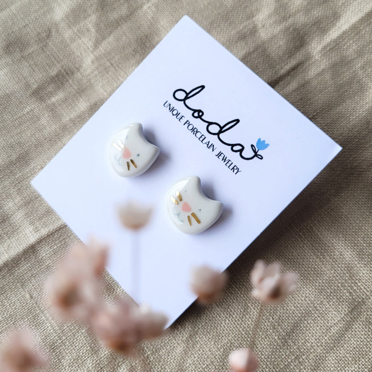 Porcelain stud earrings with gold "Tiny white kitties"