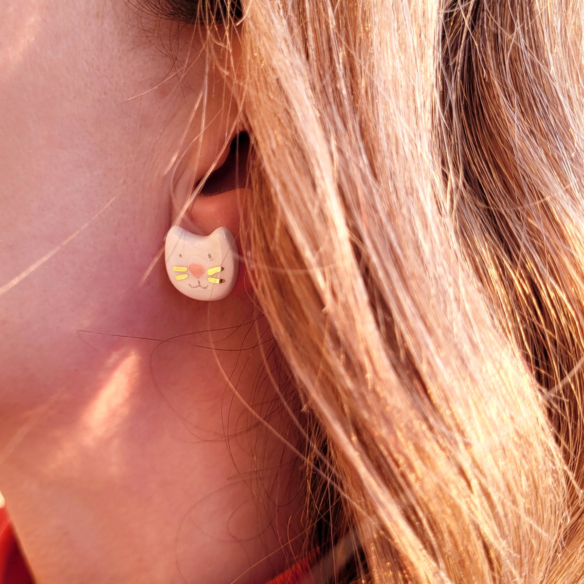 Porcelain stud earrings with gold "Tiny white kitties"