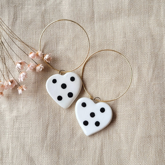 Ceramic dangle earrings "Small white hearts with big black dots"