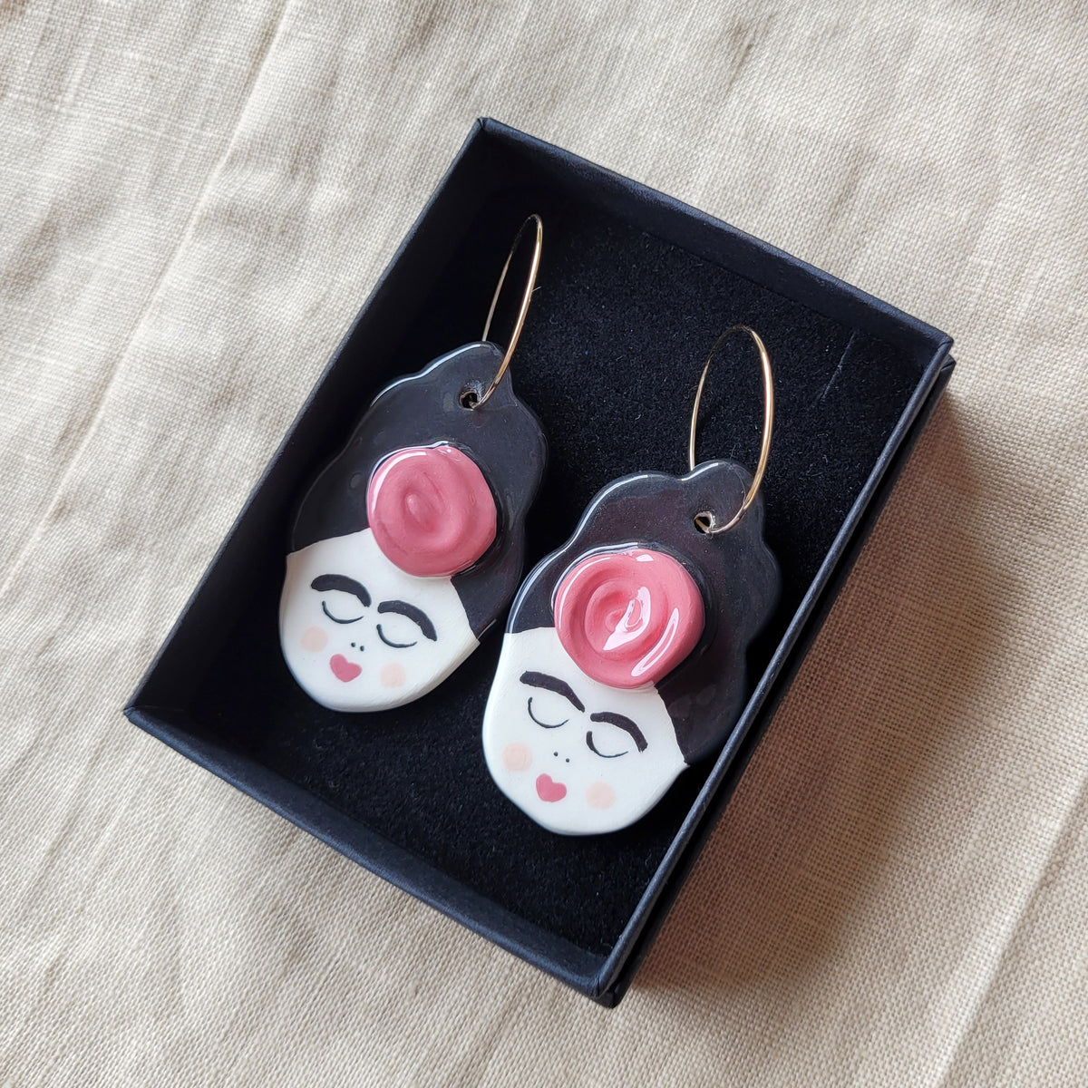 Ceramic dangle earrings "Girls with flowers"