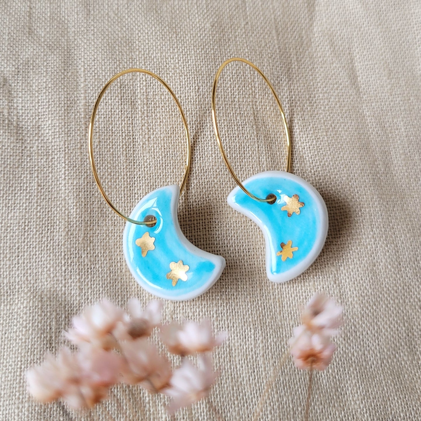 Porcelain dangle earrings with gold "Light blue moons with little gold stars"